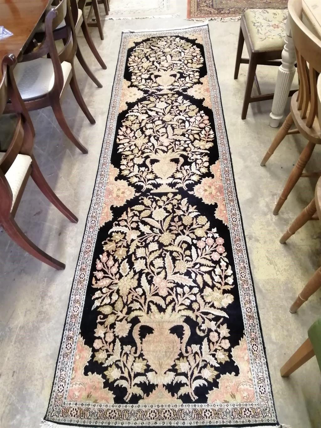 A North West Persian style dark blue ground runner, 300 x 78cm